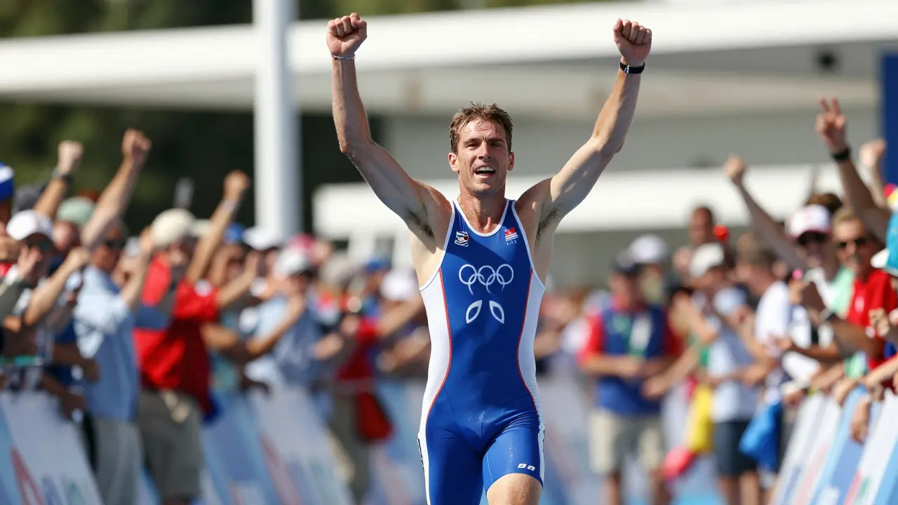Triatlonista překonávající cílovou číru na olympiádě v Atlantě